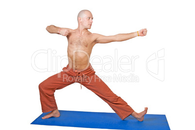 Yoga. Man in virabhadrasana position
