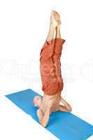 Yoga. Man in  sarvangasana position
