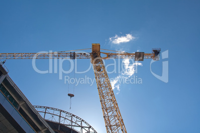 Crane and modern building in the sky and cloud