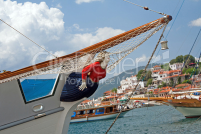 Woman figure on yacht