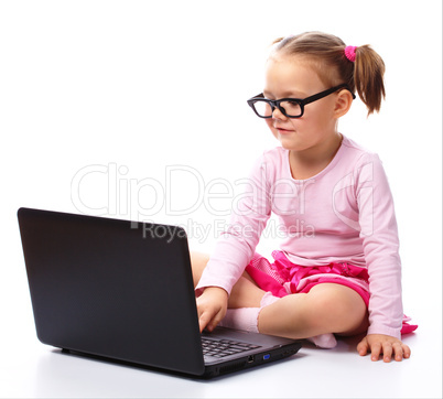 Little girl with laptop