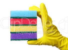 Hand holding a pile of washing sponges
