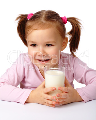Little girl with a glass of milk Little girl with a glass of milk