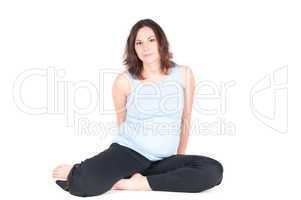 Portrait of pretty pregnant woman practicing yoga