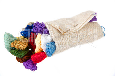 The image of silk threads for embroidery wrapped in an outline,