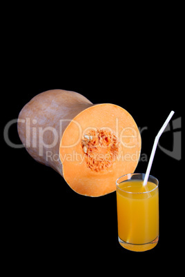Images of a glass with the pumpkin juice, isolated, on a black b