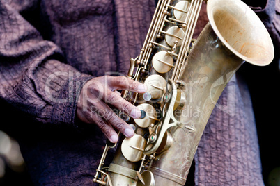 Hand and Saxophone