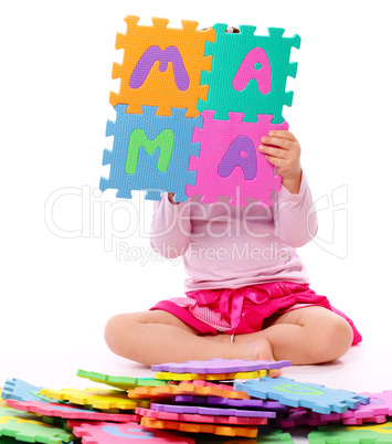 Little girl with alphabet