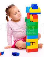 Little girl with building bricks