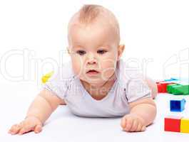 Little boy with building bricks