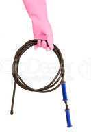 Female hand in a pink glove keeps a hawser for the water drain,