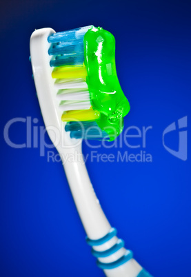toothbrush on a dark blue background