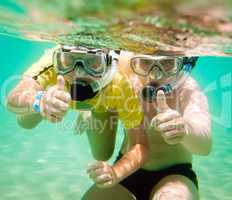 Two boys underwater