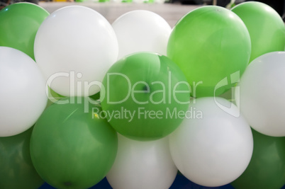 Green and white balloons