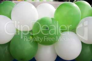 Green and white balloons