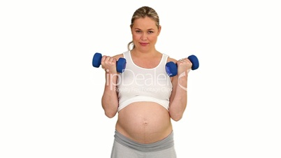 Schwangere mit Hanteln