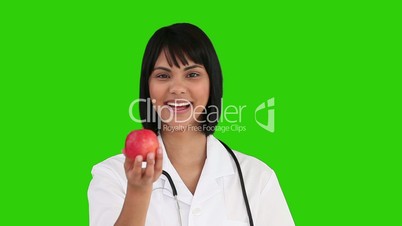 Ärztin mit Apfel