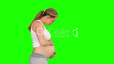 Schwangere vor einem Green-Screen