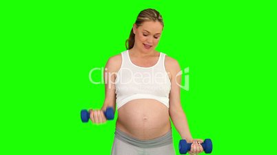 Schwangere macht Fitness