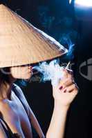woman in the Vietnamese hat