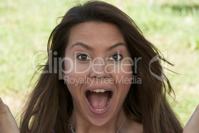 Surprised young woman making faces Happy Scream Shriek