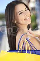 Beautiful Happy Hispanic Woman WIth Shopping Bags