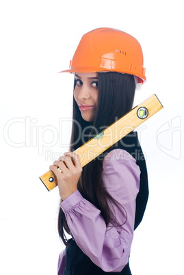 Woman in helmet with level