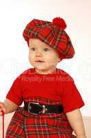 Kind im schottischem Kostüm