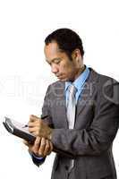 Businessman writing note