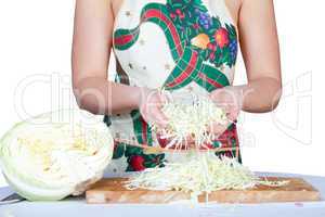 Woman with cabbage isolated on white