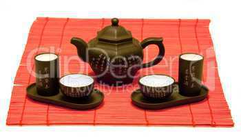 chinese tea set on red mat