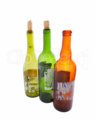 Three empty wine bottles isolated on white