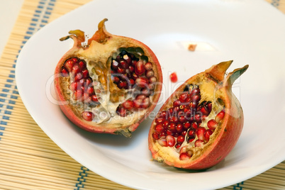 Pomegranates on white dish