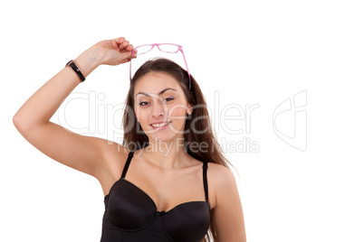 Pretty young girl in black corset with glasses