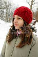 Teenage girl in red cap portrait