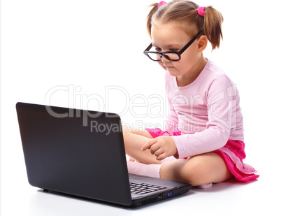 Little girl with laptop