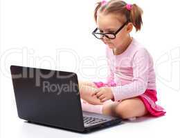 Little girl with laptop