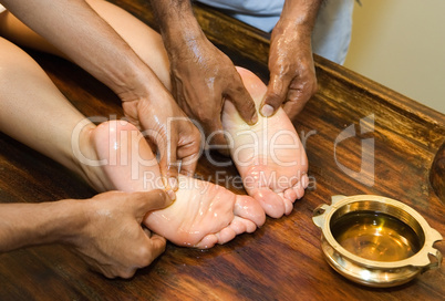 indian ayurvedic oil foot massage