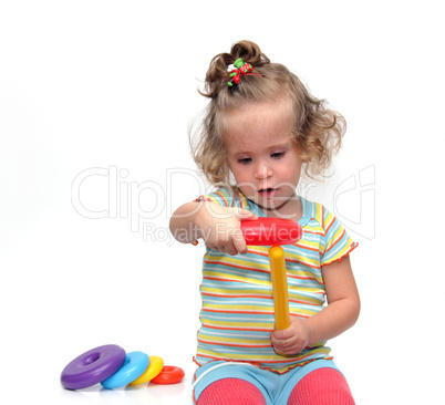 cute little girl playing with pyramid