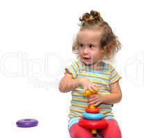 cute little girl playing with pyramid