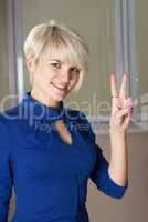 Girl with victory gesture