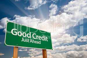 Good Credit Green Road Sign and Clouds