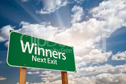 Winners Green Road Sign and Clouds