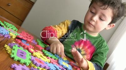 Little Boy Playing educational Toy