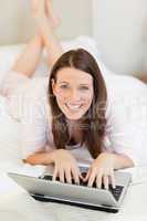 Woman looking at her laptop