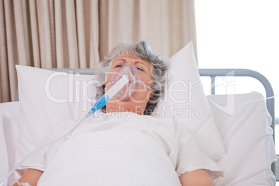 Senior woman with her respirator