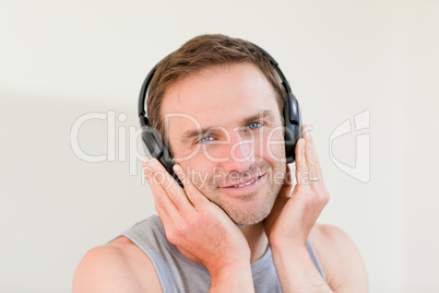 Handsome man listening to some music