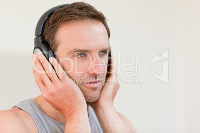 Handsome man listening to some music