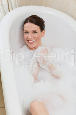 Beautiful woman taking a bath