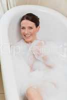 Beautiful woman taking a bath